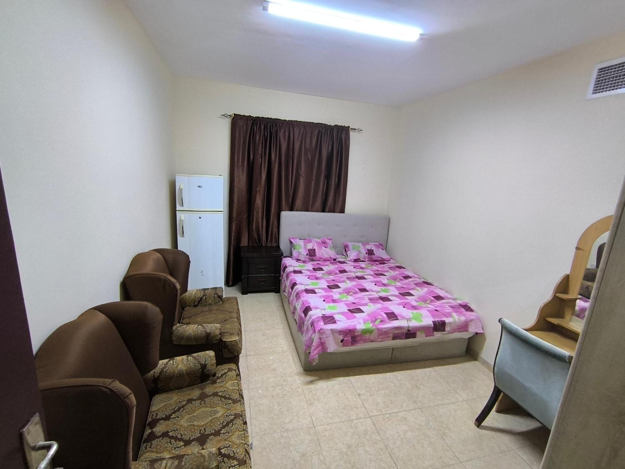 Opposite Mega Mall In Telephone Shops Roundabout Flat No 203 * Charjah