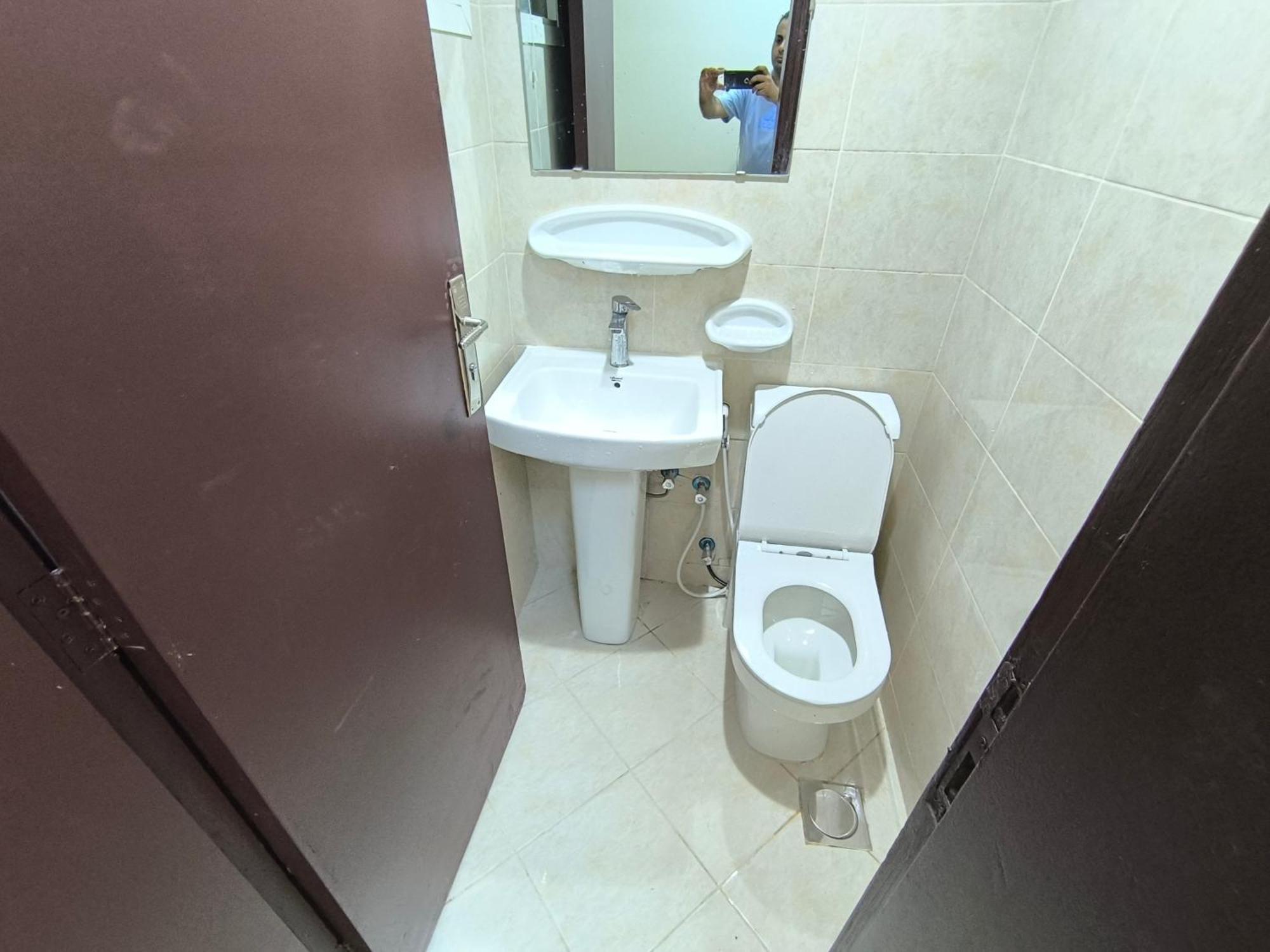 Opposite Mega Mall In Telephone Shops Roundabout Flat No 203 * Charjah
