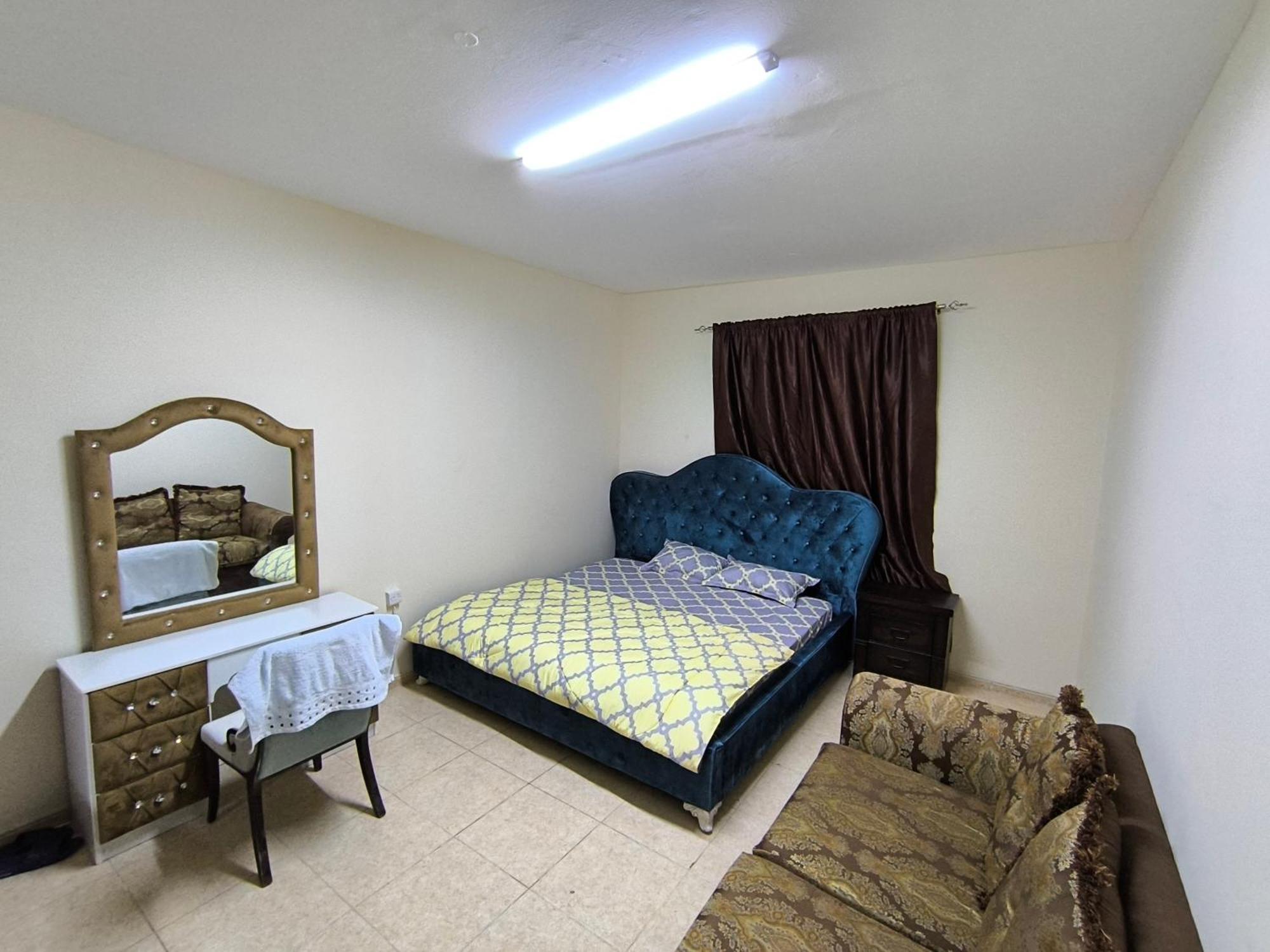 Opposite Mega Mall In Telephone Shops Roundabout Flat No 203 * Charjah